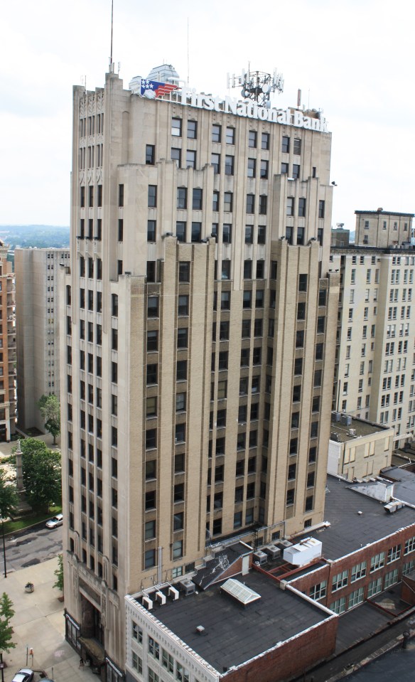 West facade showing returns at center window bays